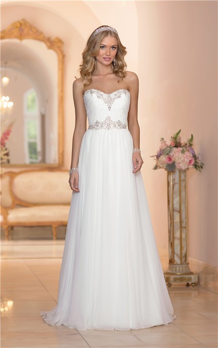 A stunning wedding dress size 20 with a beautiful court train and crystal beading